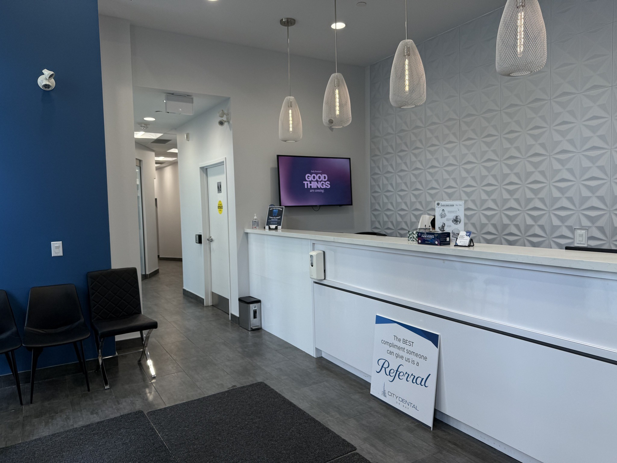 Reception and waiting area at Lok Dentistry inside City Dental on Bay, 1006 Bay Street Toronto